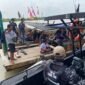 Operasi pencarian dan pertolongan (SAR) terhadap sebuah speedboat yang tenggelam akibat cuaca buruk di Perairan Tanjung Rambut, Kabupaten Karimun, Kamis (8/1/2026). Foto: Istimewa