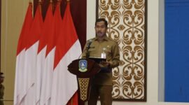 Kepala Bappeda Provinsi Kepri Aries Fhariandi memberikan kata sambutan. Foto: Diskominfo Kepri