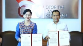 Otoritas Jasa Keuangan (OJK) dan Bareskrim Polri menandatangani Perjanjian Kerja Sama (PKS) untuk memperkuat koordinasi penanganan tindak pidana di sektor jasa keuangan. Foto: Istimewa