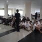Sebanyak 210 warga negara asing (WNA) yang diduga menjalankan penipuan investasi daring di sebuah apartemen di Kecamatan Lubuk Baja, Kota Batam, Rabu (6/5/2026). Foto: Istimewa