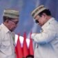 Presiden Prabowo Subianto menerima penghargaan Lencana Emas Adi Bhakti Tani Nelayan Maha Utama dari Kontak Tani Nelayan Andalan (KTNA) Nasional pada Puncak Pekan Nasional (PENAS) Petani dan Nelayan XVII Tahun 2026 di Sport Center Limboto, Kabupaten Gorontalo, Provinsi Gorontalo, pada Rabu (24/6/2026). BPMI Setpres