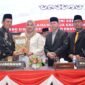 Penyerahkan Rancangan Peraturan Daerah (Ranperda) Pertanggungjawaban Pelaksanaan APBD Tahun Anggaran 2025 kepada DPRD Kepri dalam Rapat Paripurna di Balairung Raja Khalid Hitam, Jumat (26/6/2026). Foto: Istimewa