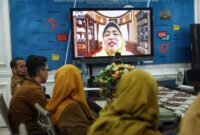 Sekretaris Daerah Provinsi Kepri Misni, membuka Bimbingan Teknis Penguatan Kompetensi Petugas Pelayanan Pengaduan SP4N-LAPOR! di lingkungan Pemprov Kepri secara virtual, Selasa (15/9/2026). Foto: Diskominfo Kepri