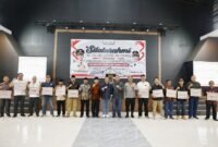 Wali Kota Batam, Amsakar Achmad, menyampaikan sambutan saat menghadiri silaturahmi bersama RT, RW, LPM se-Kecamatan Sagulung di Gedung Serbaguna Plaza Kecamatan Sagulung, Sabtu (3/10/2026) malam. Foto: Humas Diskominfo Batam